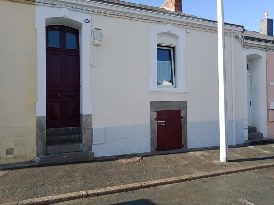 Rénovation de façade de ville par Atelier Nuance